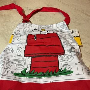 Peanut’s Red and White Kitchen Apron with Snoopy & Woodstock with cartoon strip.
